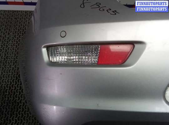 Бампер задний на Chevrolet Cruze I (J300)