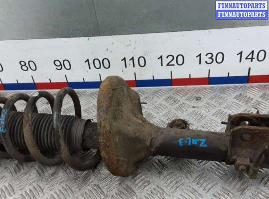 купить амортизатор задний левый на HYUNDAI TUCSON JM