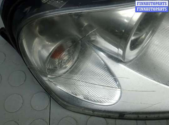 Фара передняя на Volkswagen Touareg I (7L)