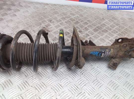 Стойка подвески амортизационная на Nissan Qashqai I (J10)