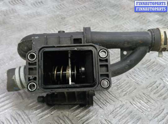 Корпус термостата на Volvo V40 Cross Country (P1)