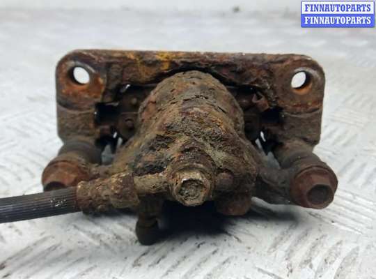 купить суппорт тормозной задний правый на NISSAN QASHQAI J10