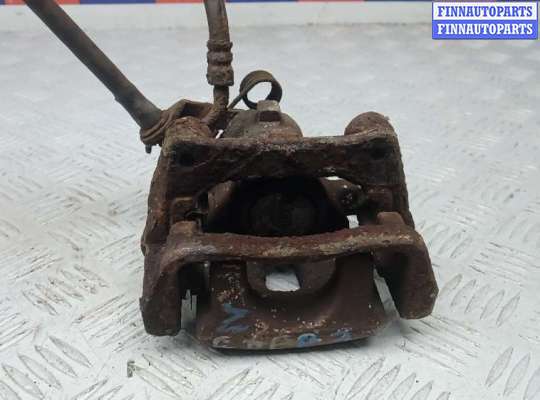 купить суппорт тормозной задний правый на KIA VENGA 1