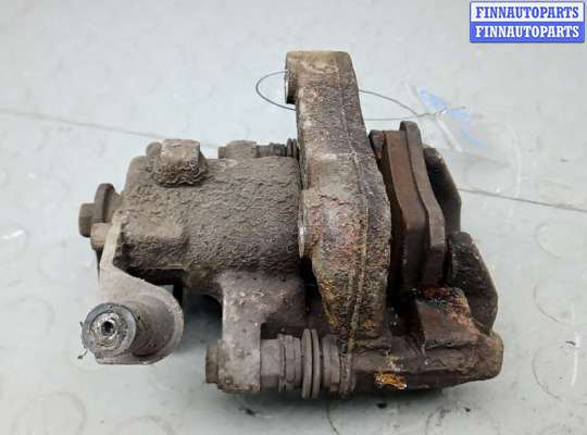 купить суппорт тормозной задний левый на SKODA RAPID