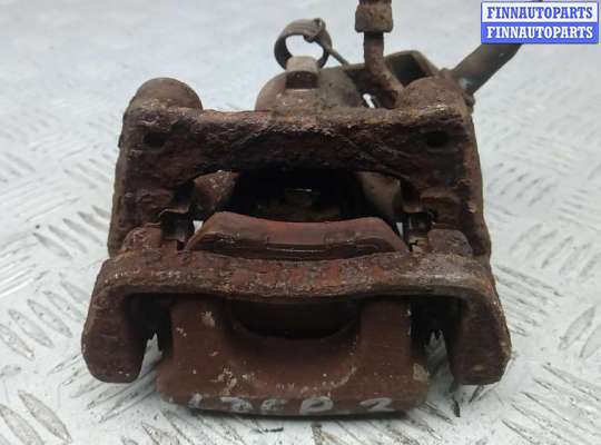 купить суппорт тормозной задний левый на KIA VENGA 1