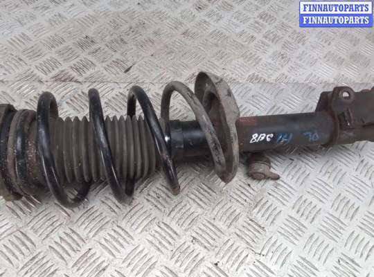 стойка передняя левая OP2349443 на OPEL COMBO D