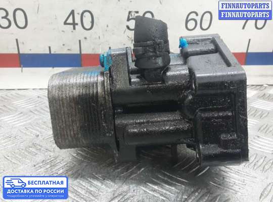 Корпус масляного фильтра на Skoda Octavia (1Z, A5)