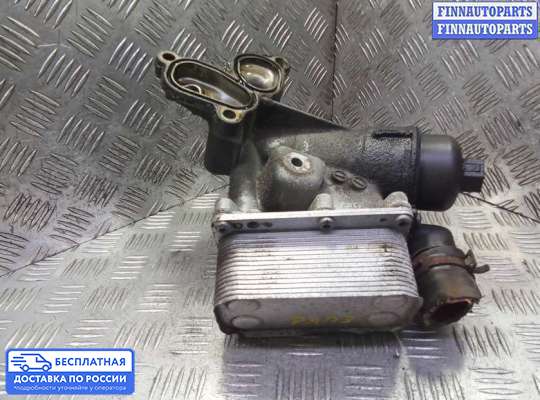Корпус масляного фильтра на Nissan Qashqai I (J10)