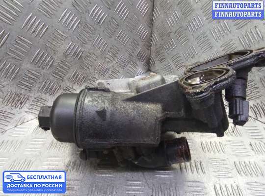 Корпус масляного фильтра на Nissan Qashqai I (J10)