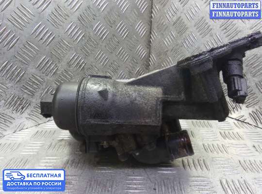Корпус масляного фильтра на Nissan Qashqai I (J10)
