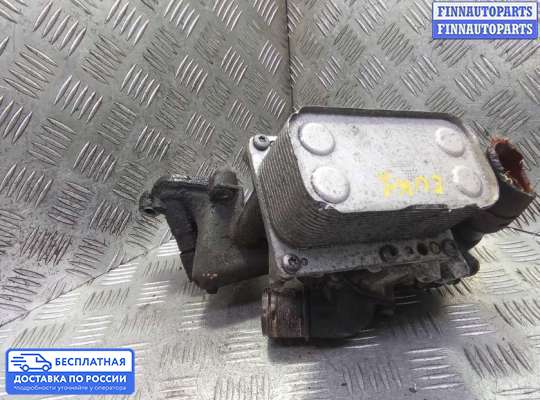 Корпус масляного фильтра на Nissan Qashqai I (J10)