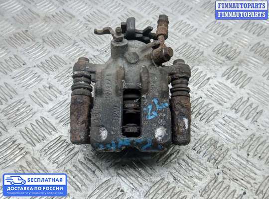 Суппорт на Nissan Tino V10