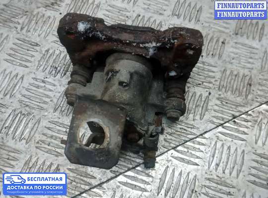 Суппорт на Nissan Tino V10