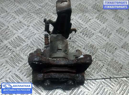Суппорт на Nissan Tino V10