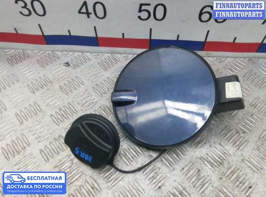 Лючок бензобака на Opel Zafira B