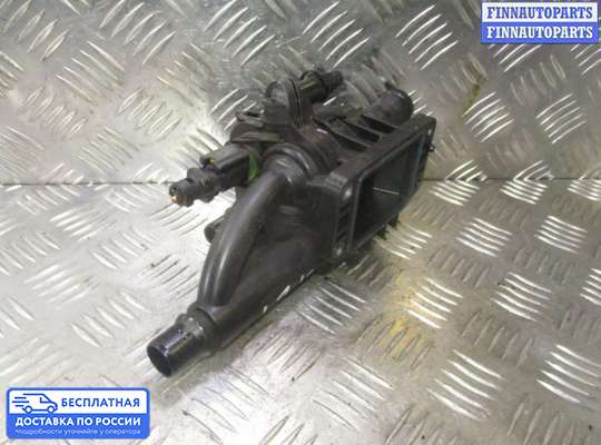 Корпус термостата на Peugeot 207