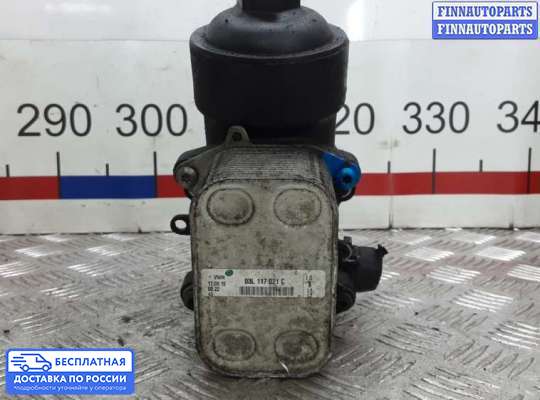 Корпус масляного фильтра на Skoda Superb II (3T)