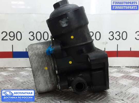 Корпус масляного фильтра на Skoda Superb II (3T)