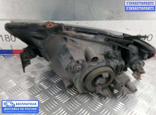 Фара передняя на Mitsubishi L200 (KA, KB)