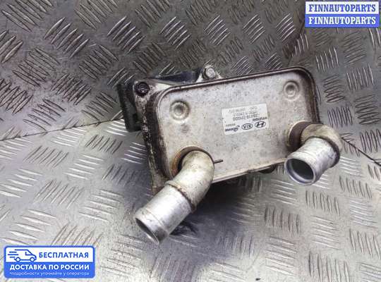 Корпус масляного фильтра на Kia Sorento II (XM)