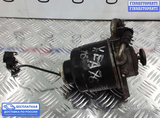 Корпус топливного фильтра на Mitsubishi L200 (KA, KB)