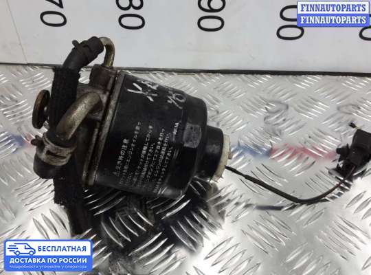 Корпус топливного фильтра на Mitsubishi L200 (KA, KB)