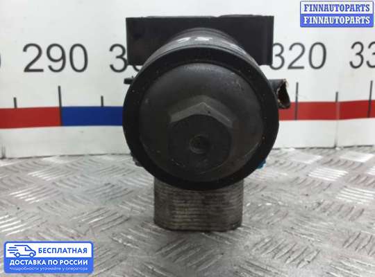 Корпус масляного фильтра на Volkswagen Passat B7 (36)