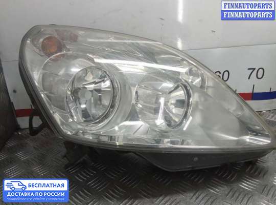 Фара передняя на Opel Zafira B