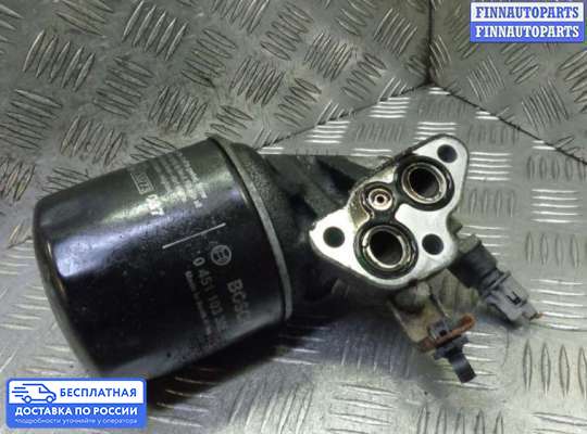 Корпус масляного фильтра на Toyota Avensis II (T250)