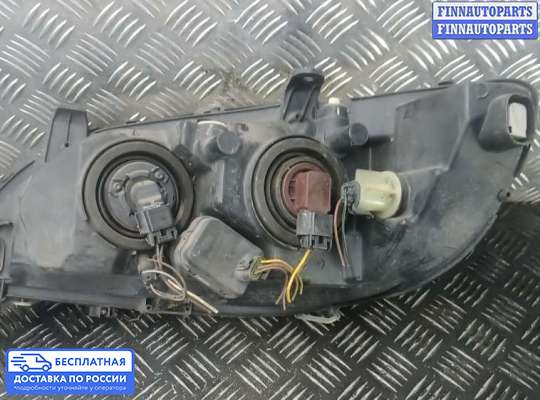 Фара передняя на Opel Zafira A