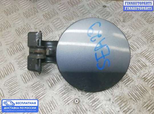 Лючок бензобака на Mitsubishi Lancer X