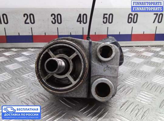 Корпус масляного фильтра на Nissan Qashqai I (J10)