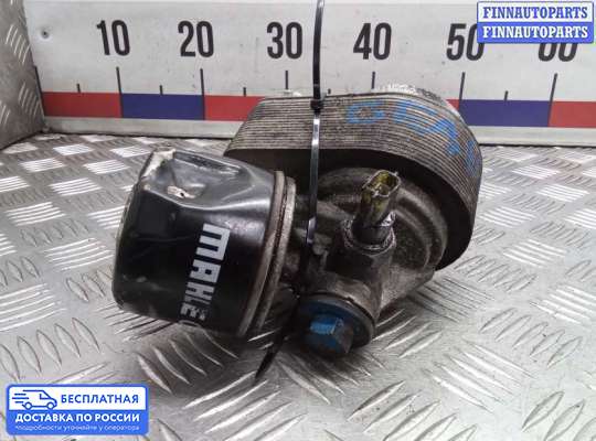 Корпус масляного фильтра на Nissan Qashqai I (J10)