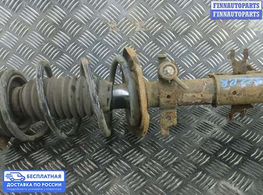 Пружина подвески на Renault Laguna III