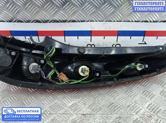 Фонарь задний на Nissan Tino V10