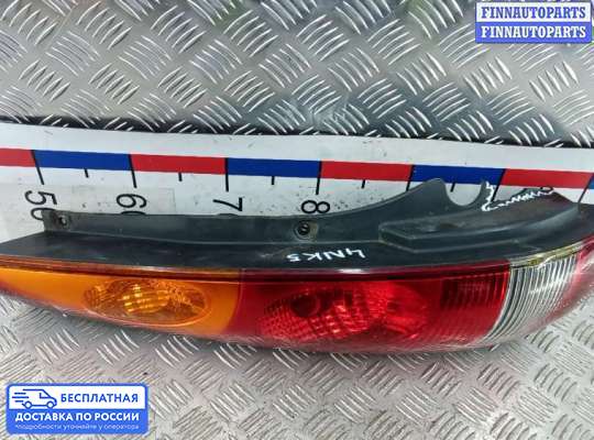 Фонарь задний на Nissan Tino V10
