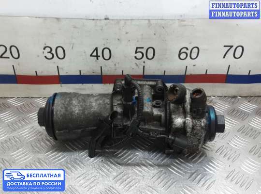 Корпус масляного фильтра на Skoda Superb II (3T)