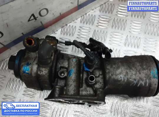 Корпус масляного фильтра на Skoda Superb II (3T)