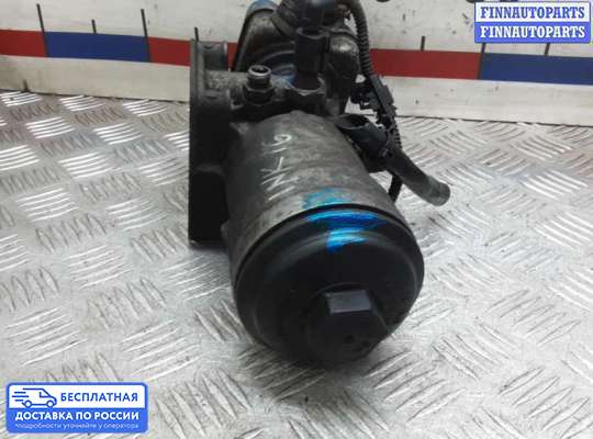 Корпус масляного фильтра на Skoda Superb II (3T)