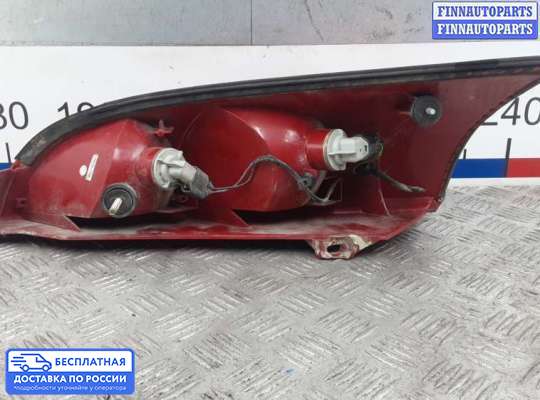 Фонарь задний на Ford Focus I