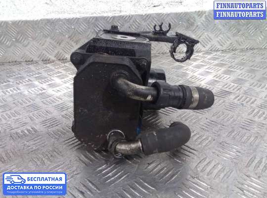 Корпус масляного фильтра на Ford Mondeo IV