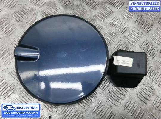 Лючок бензобака на Opel Zafira B