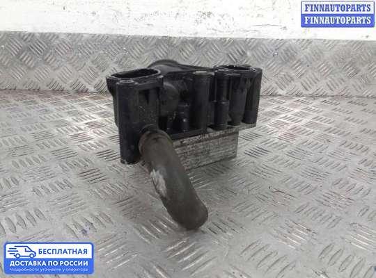 Корпус масляного фильтра на Nissan Qashqai I (J10)