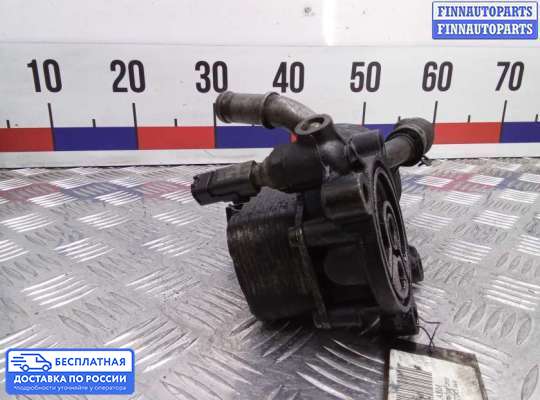 Корпус масляного фильтра на Ford Kuga I