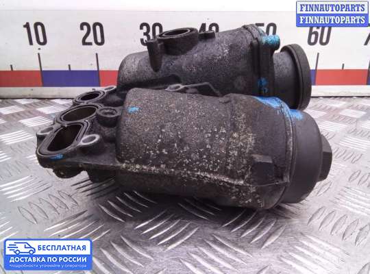 Корпус масляного фильтра на Volvo XC90