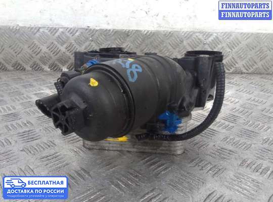 Корпус масляного фильтра на Nissan Qashqai I (J10)