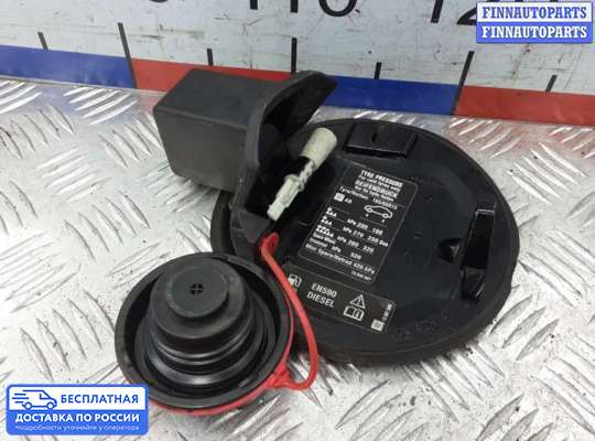 Лючок бензобака на Opel Corsa D
