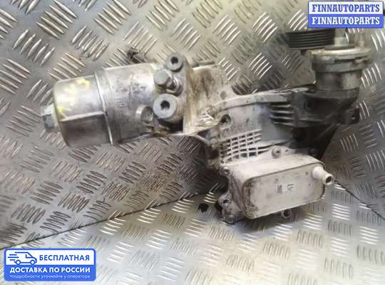 Корпус масляного фильтра на Chevrolet Cruze I (J300)