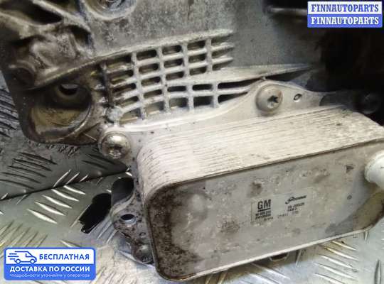Корпус масляного фильтра на Chevrolet Cruze I (J300)