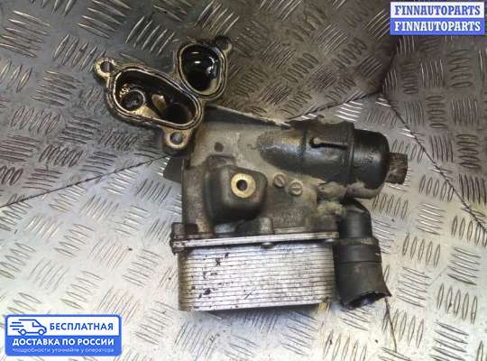 Корпус масляного фильтра на Nissan Qashqai I (J10)